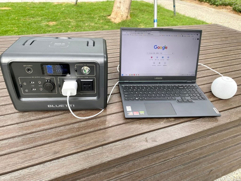 use BLUETTI EB70S Portable Power Station in the garden to power a Lenovo and a Apple Home Pod